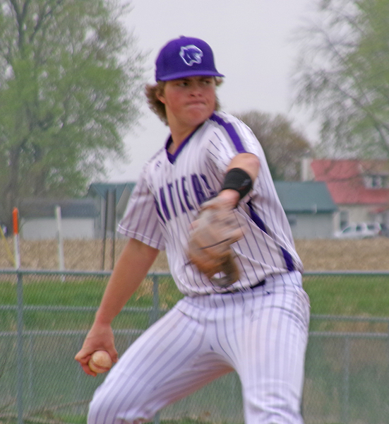 A determined Wyatt Pierson, number 28, readies a pitch.