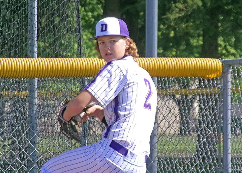Starting pitcher, Hudson Briggs (#2), warming up in the bullpen.