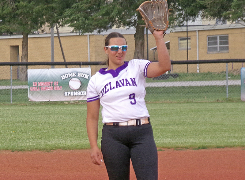 Lainey Klokkenga (#9) on the mound practicing her pitching.
