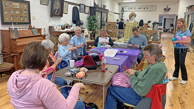 From left to right: Karla Carr, Liz Fortney, Janice Allgood, Mary Ruth Lowry, Diane Heberer, Mark Griffith, Avery Griffith, Gail Strunk.