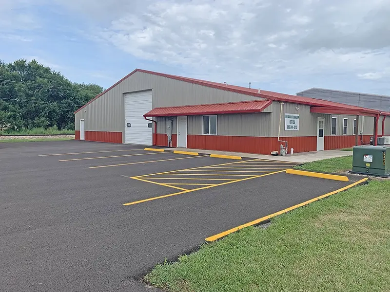 Freshly resurfaced parking lot at the Delavan Township building, following completion of the improvement project.