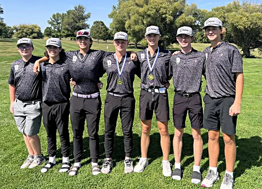 The Delavan Boys Varsity Golf Team stands united after a thrilling finish at the Ray Toland PORTA Invitational—(from left) Carson Ibbotson, Drake Neuendorf, Lyndon Miller, Grady Burrell, Trace Kight-Garlisch, Caden Rassi, and Hudson Briggs—each contributing to a team score that tied for first before a tiebreaker decided the title.