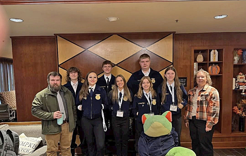 Riley Fann, Jaxton Westbrook, McKinleigh Sipka, Isaac Meeker, Maddy Albers, Kaelenn Morris, and Annalise Clendenny with advisors Theo Allen and Nicole Phillips—and of course, Snoop Frog, the chapter’s spirited mascot.