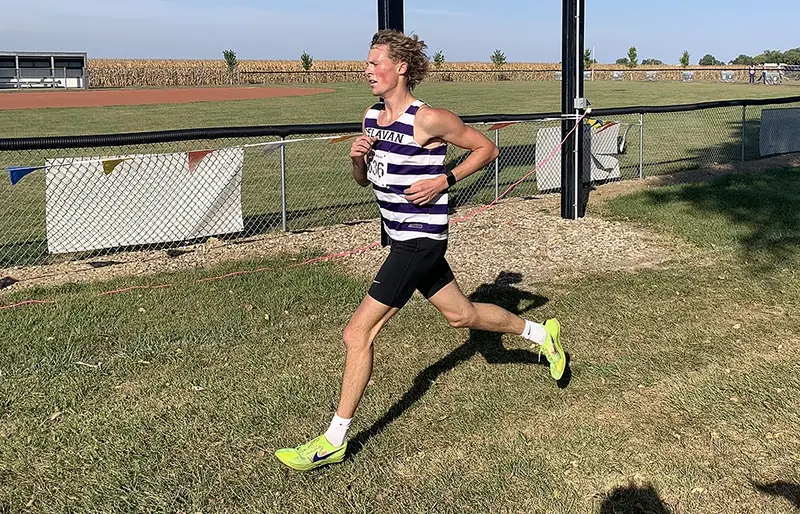 Corie Green charges through the final stretch, focused and relentless, as he locks in a third-place finish at the Delavan Panther Invitational.