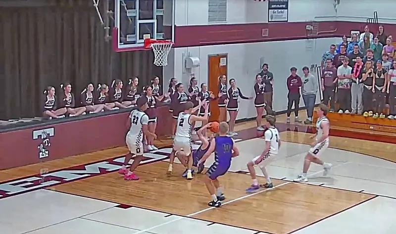 Panthers junior #13 Corbin Soldal fights through a slip on his drive, still forcing up the shot against Tremont’s defense.