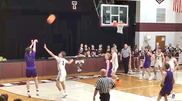James Pagel (#3) rises for a three?pointer over the Tremont defense during the regional semifinal matchup.
