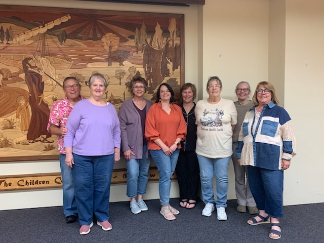 From left: Millie Weyhrich, Julie Rose, Sallie Lessen, Leann Price, Becky Fisher, Le Ann Ryan, Bianca Altenburger and Karen Ramos gather for the Quilt Guild’s May meeting, enjoying an evening of shared projects, creativity and community.