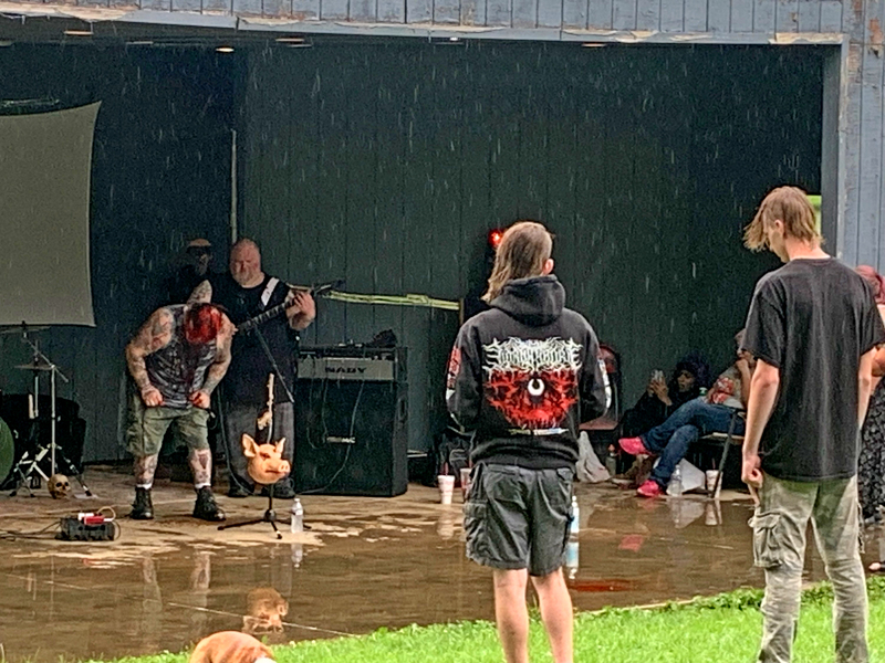 Hollowpoint Facelift of Quincy, Illinois, unleashes a wall of sound at Lake Park, firing up a rain-soaked crowd during the “Save the Stage” concert.
