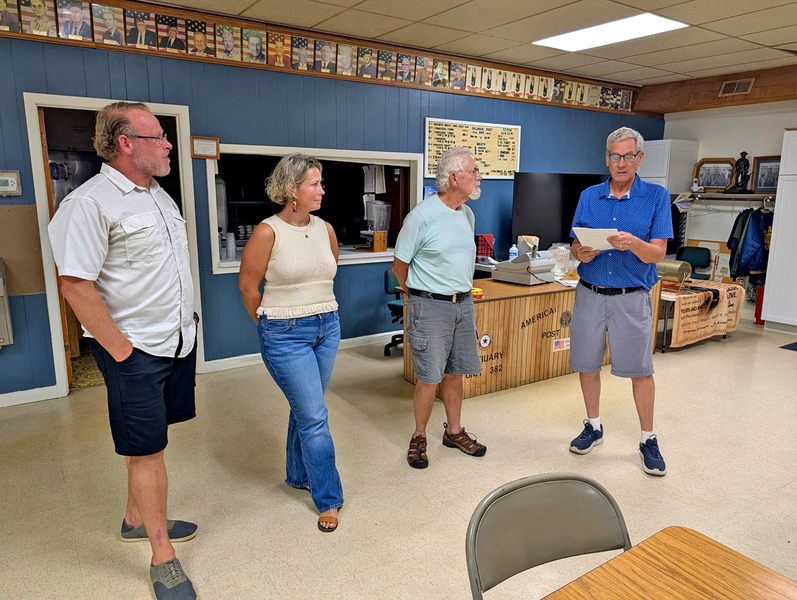 New Delavan Optimist Club members Steve Watts, Kelly Watts and John Wiser (from left) recite the Optimist oath as Membership Director Steve Skinner administers the pledge during a recent club meeting.