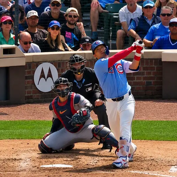 Seiya Suzuki watches his sixth-inning three-run homer sail into the left-center field bleachers Friday at Wrigley Field. Suzuki’s 21st home run of the season provided all the offense the Cubs needed in a 3-0 victory over the rival St. Louis Cardinals.