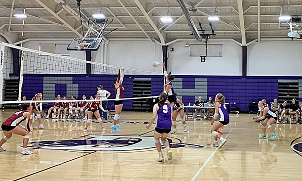 Jaylyn Diekhoff sends the ball back over the net against Havana, showcasing her defensive intensity that fueled an impressive performance.