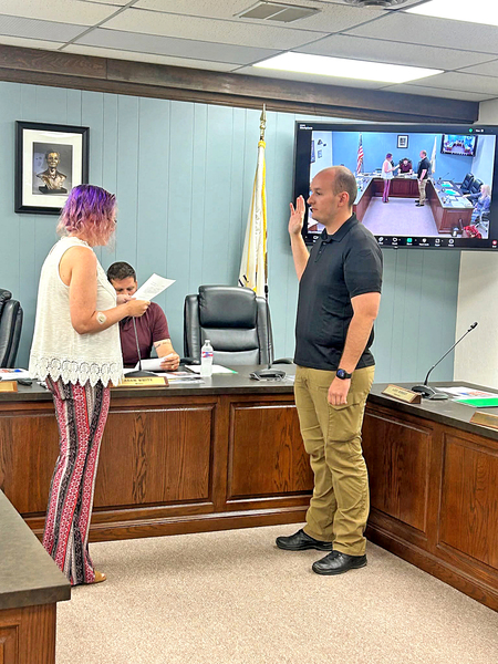 Logan Weseloh is sworn in as a full-time officer with the Delavan Police Department.