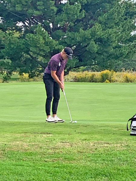 Grady Burrell carefully lines up a putt during the IHSA Class 1A Regional at Shambolee Golf Course in Petersburg. Burrell fired a 71 to finish second individually and help lead Delavan to a runner-up team finish and a berth in the upcoming sectional tournament.