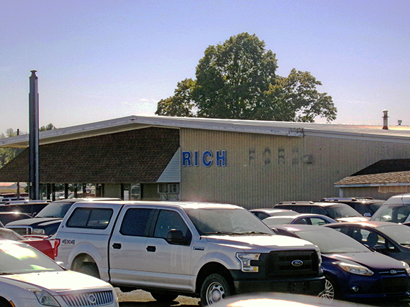 A new chapter begins at Roland Rich as the iconic “FORD” letters come down from the dealership facade, marking the transition from Rich Ford to Rich Automotive and a renewed focus on pre-owned vehicle sales and service.